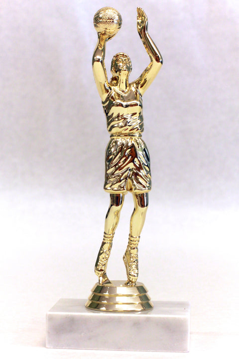 Taking the shot- Female Basketball 7.5 inches tall